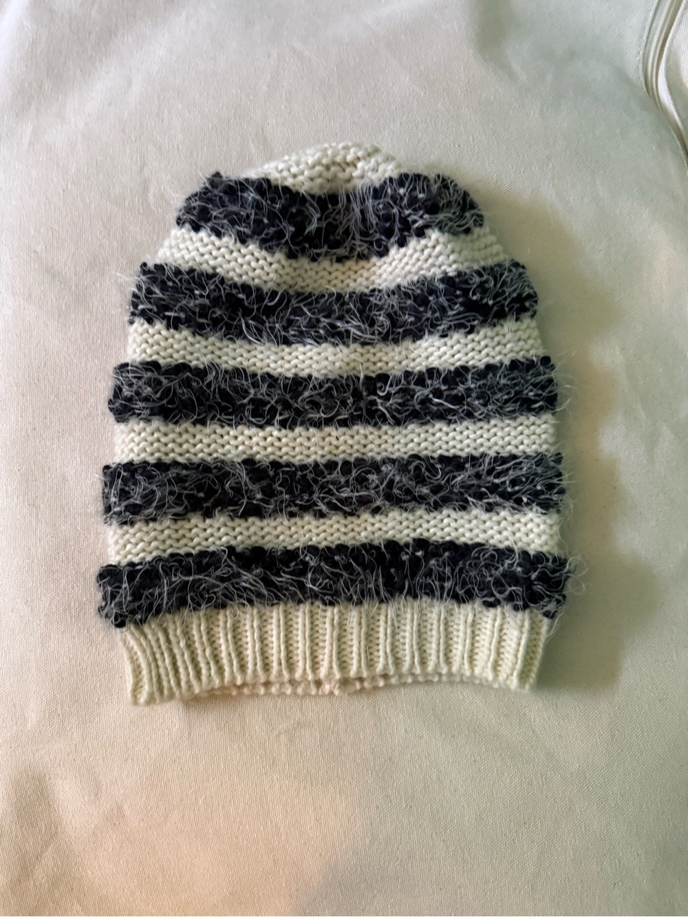 Anthropologie Black and Cream Striped Fuzzy Knit Beanie